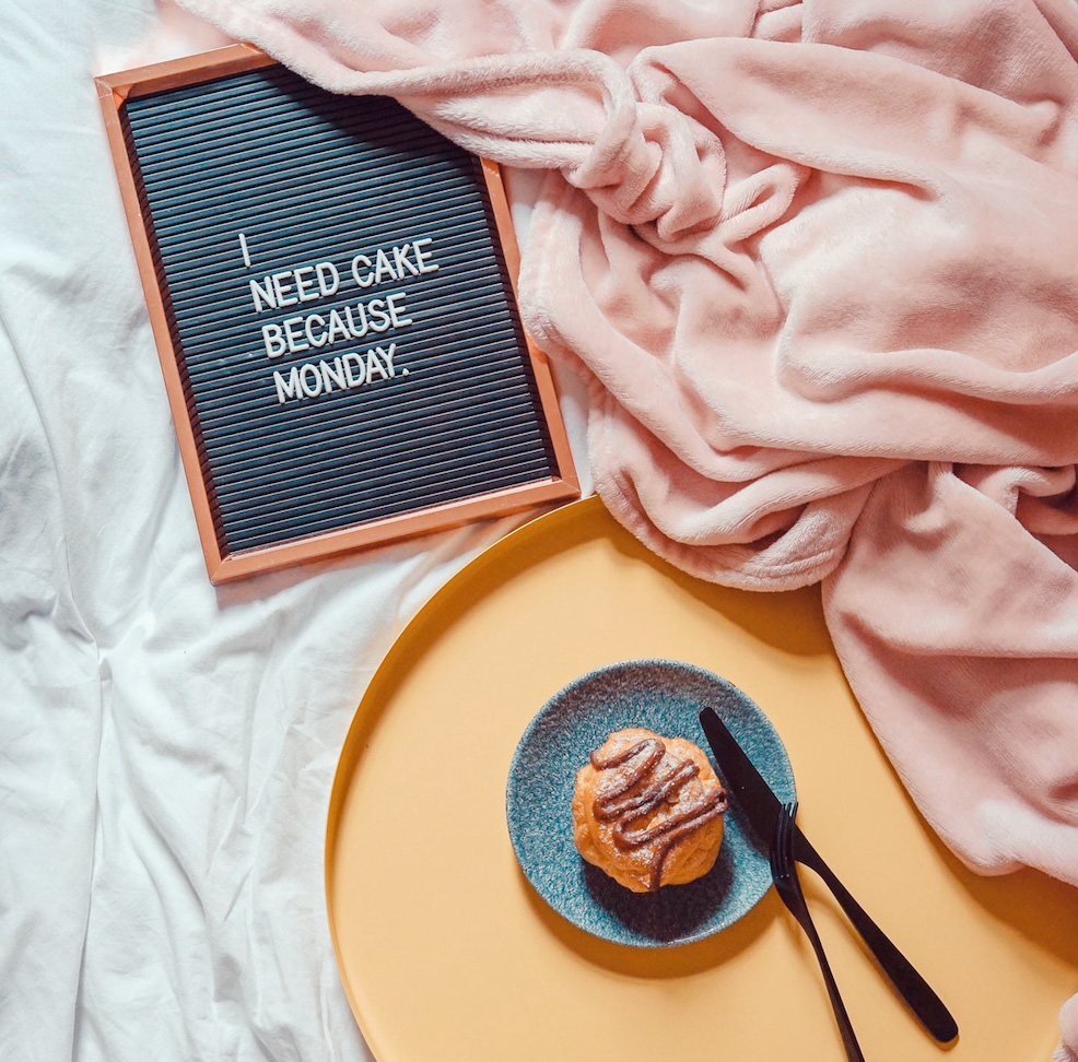 Eating in bed on a Monday to justify a reasoning.